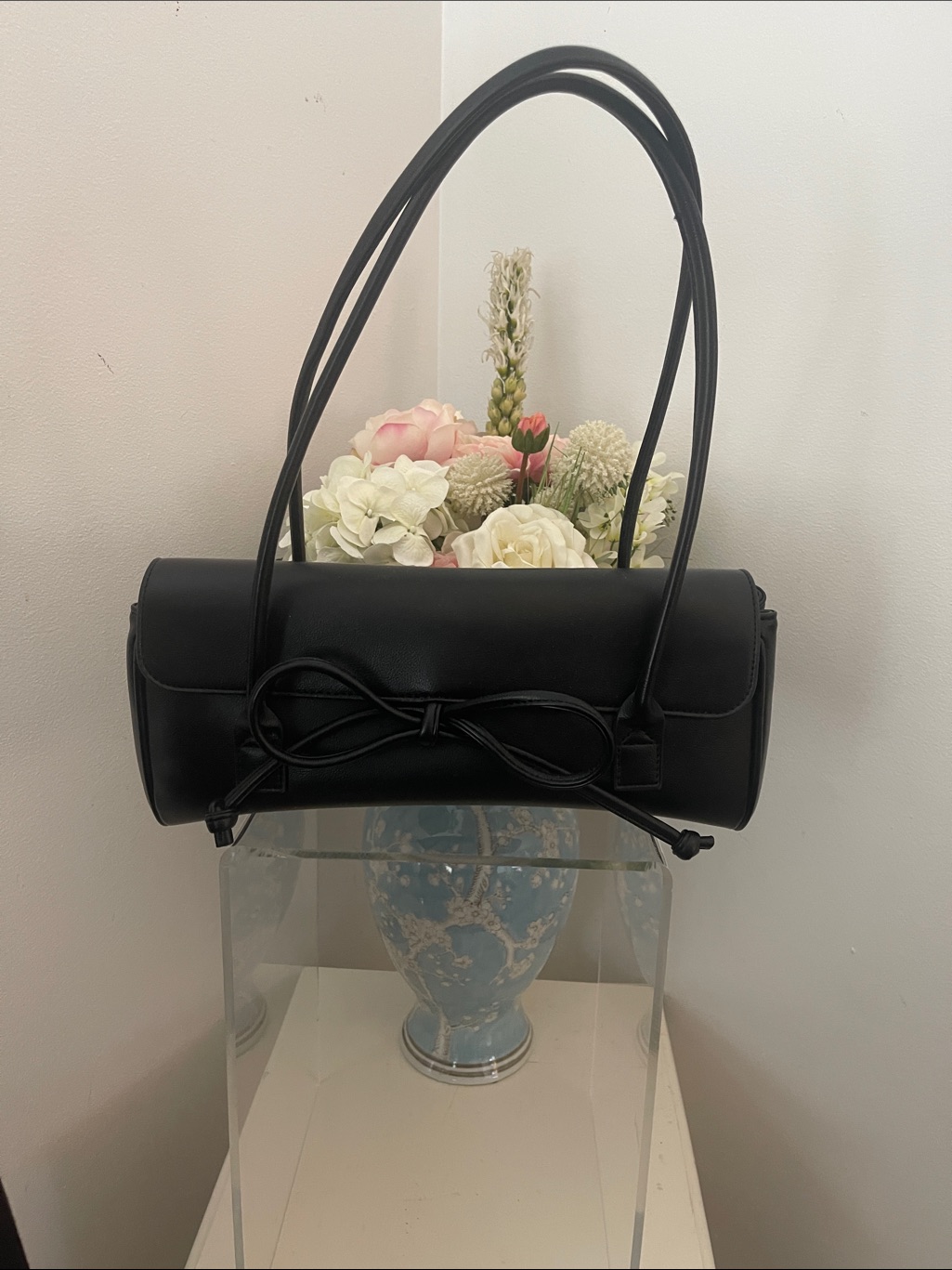 Melie Bianco Black Cylinder Shoulder Bag With Bow Detail